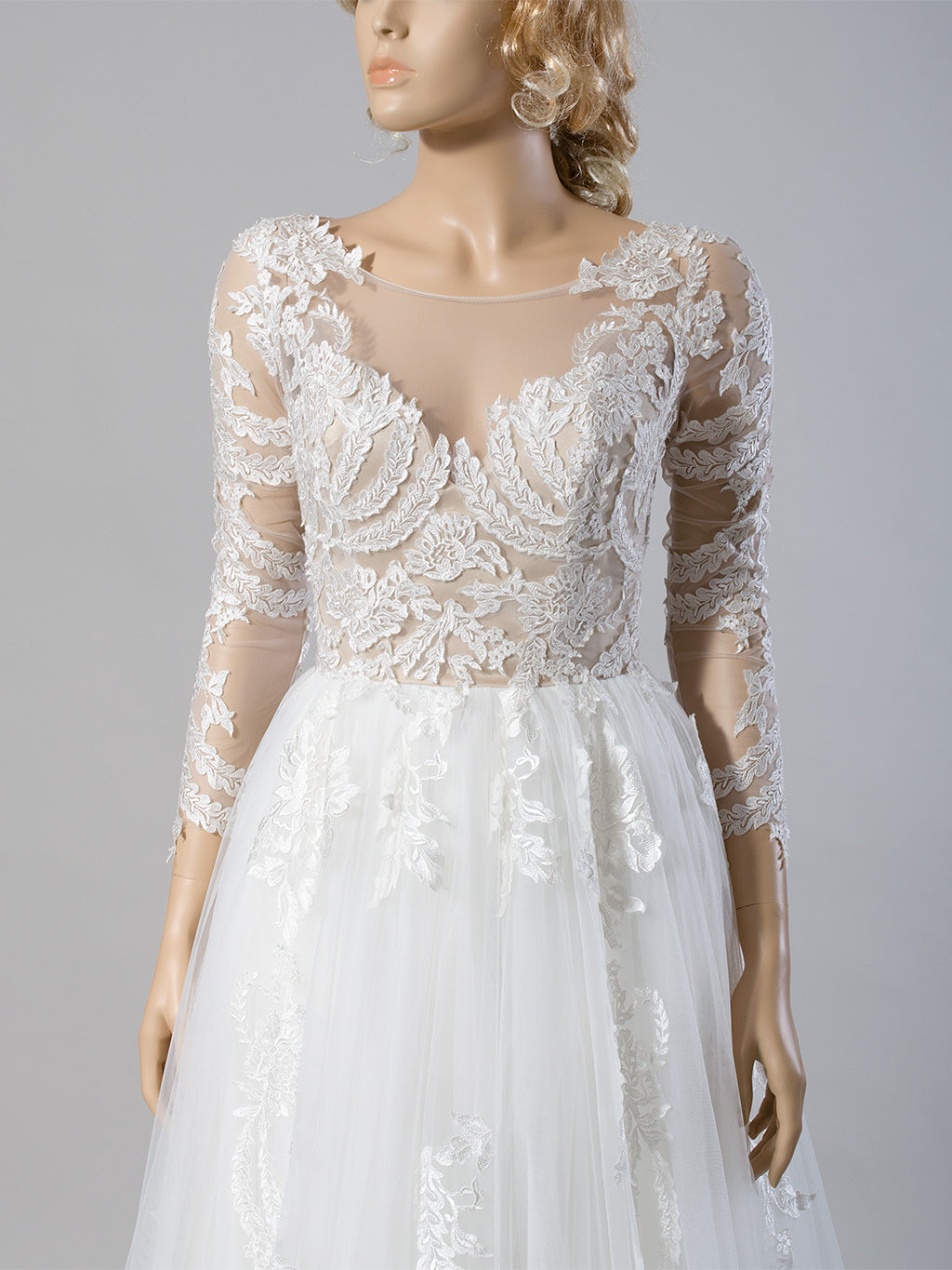 Long sleeve lace wedding dress with embroidered lace