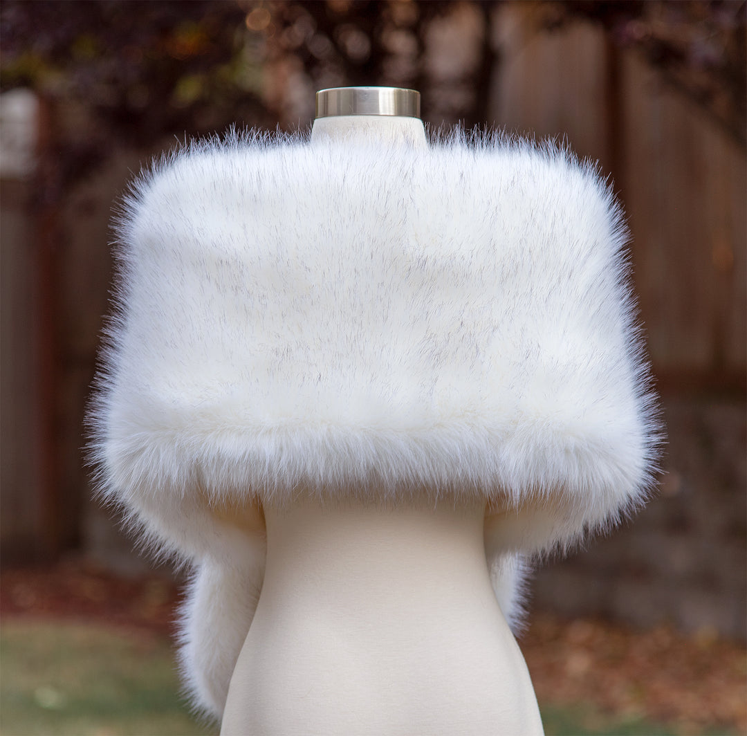 Light ivory faux fur wrap with black tips