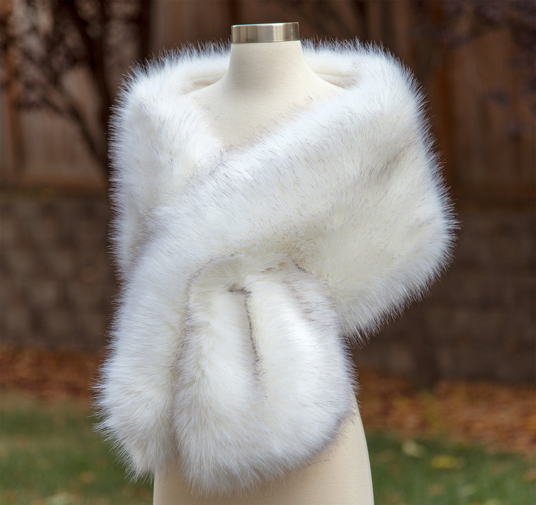Light ivory faux fur wrap with black tips