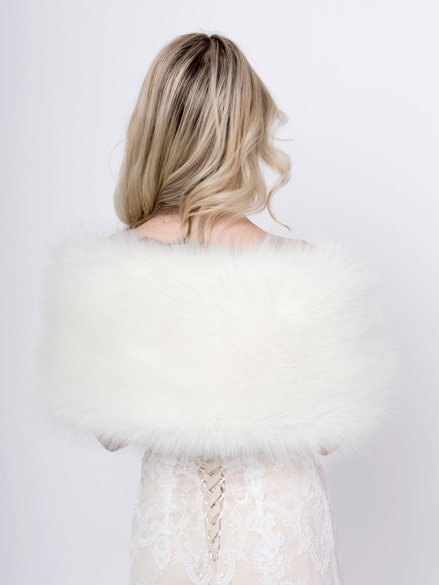 Ivory faux fur wrap with longer furs